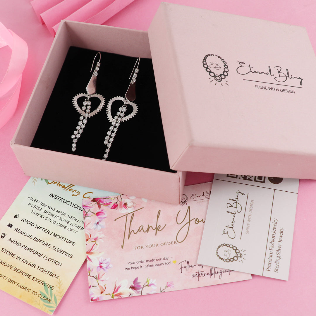 Eternal Bling Sterling Silver Hanging Heart Rhodium Earrings