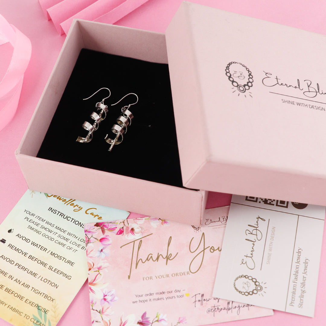 Eternal Bling Sterling Silver Curl Hanging Rhodium Earrings